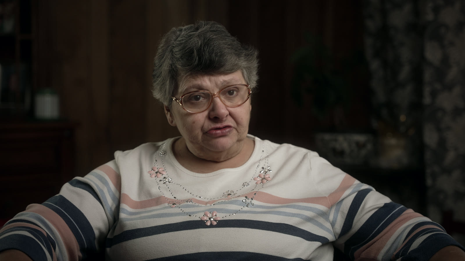 Rosemarie Croft, mother of Barry Croft, seated for a filmed interview in her living room